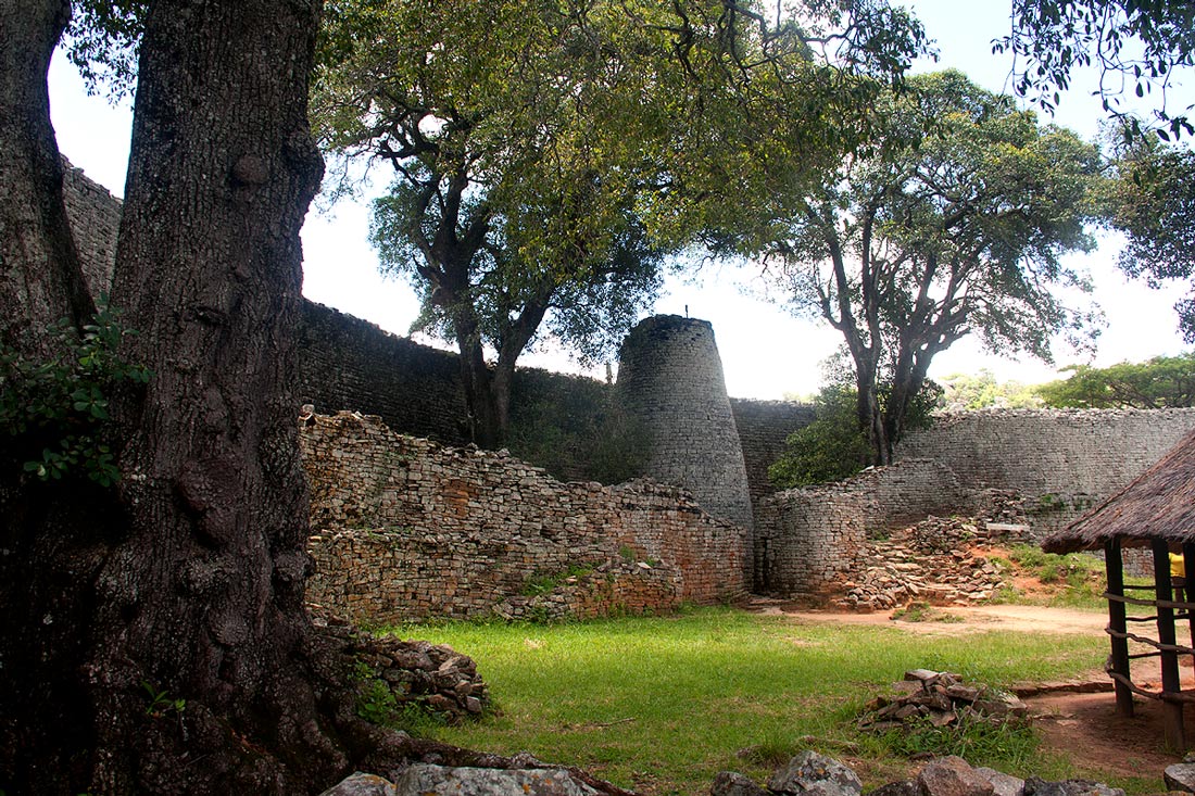 The Conical Tower in the Great Enclosure flanked by ancient specimens of Mimusops zeyheri.
